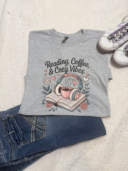 Reading, Coffee & Cozy Vibes tee styled with jeans and sneakers